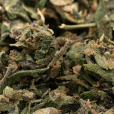 Close-up of dried Northern Lights THCa indoor trim hemp flower with trichomes