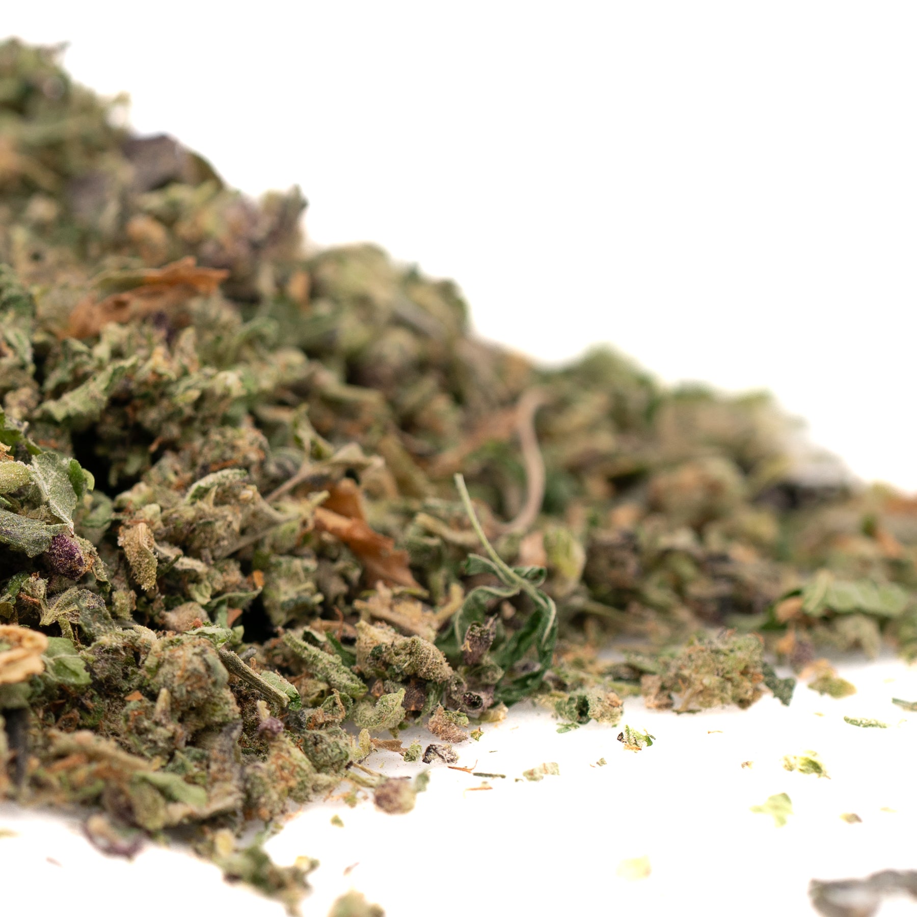 Dried crushed green herbs from Northern Lights THCA Indoor Trim wholesale hemp flower