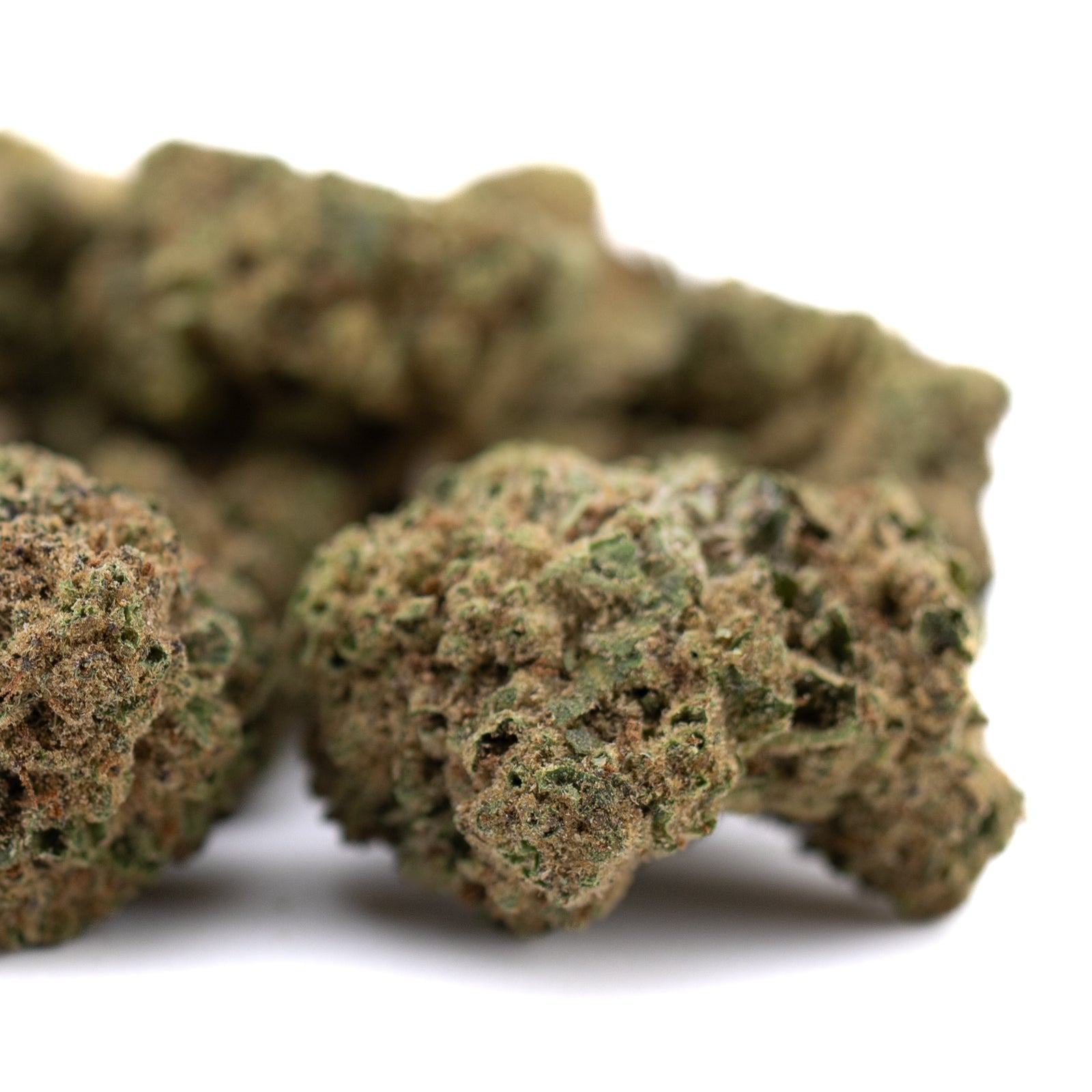 Dried Pablo THCa Flower Sherb Cake with visible trichomes and green hues for high THCA potency