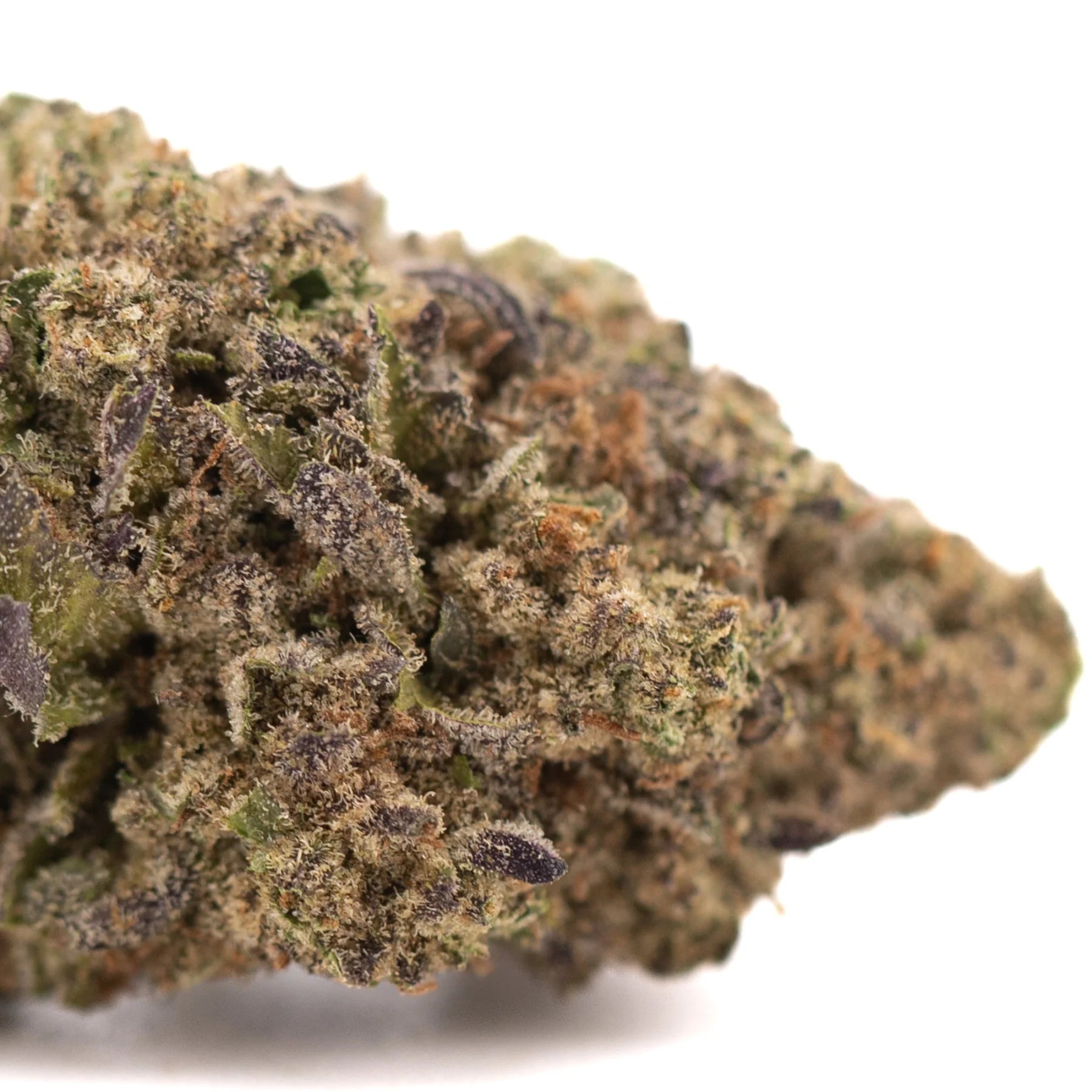 Dense peach pie hemp flower bud with green and purple hues covered in trichomes high in total cannabinoids