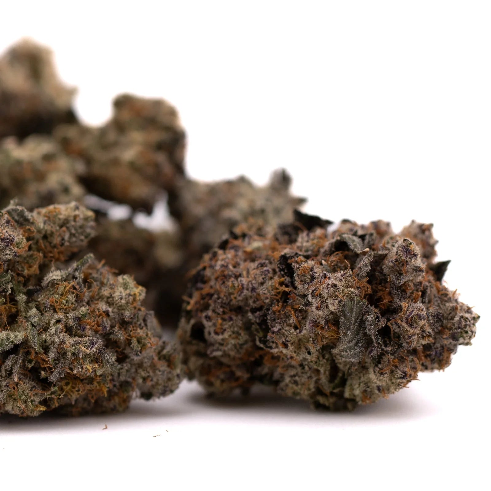 Dark reddish-brown Peach Tree THCa Indoor Flower hemp flower with trichomes