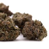 Dark green and purple hemp flower with trichomes and orange hairs, Peach Tree THCa Indoor Flower