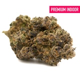 Dense trichome-covered Pineapple Rainbow Indoor THCa Flower with purple and green hues