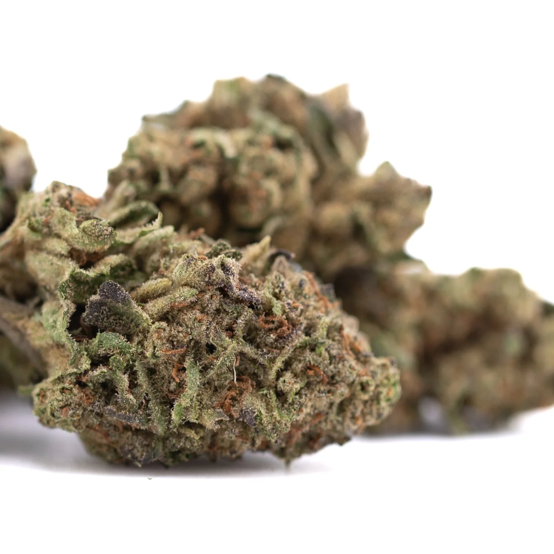 Mature poison gushers thca hemp flower buds with dense green and brown trichomes for ultra-premium potency thca flower