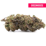 Poppin Bottlez THCa hemp flower rozay cake dense resinous bud with green and dark purple hues from greenhouse cultivation