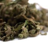 Dried pound town full-term thca trim wholesale hemp flower with green and brown hues covered in fine trichomes rich in cannabinoid content