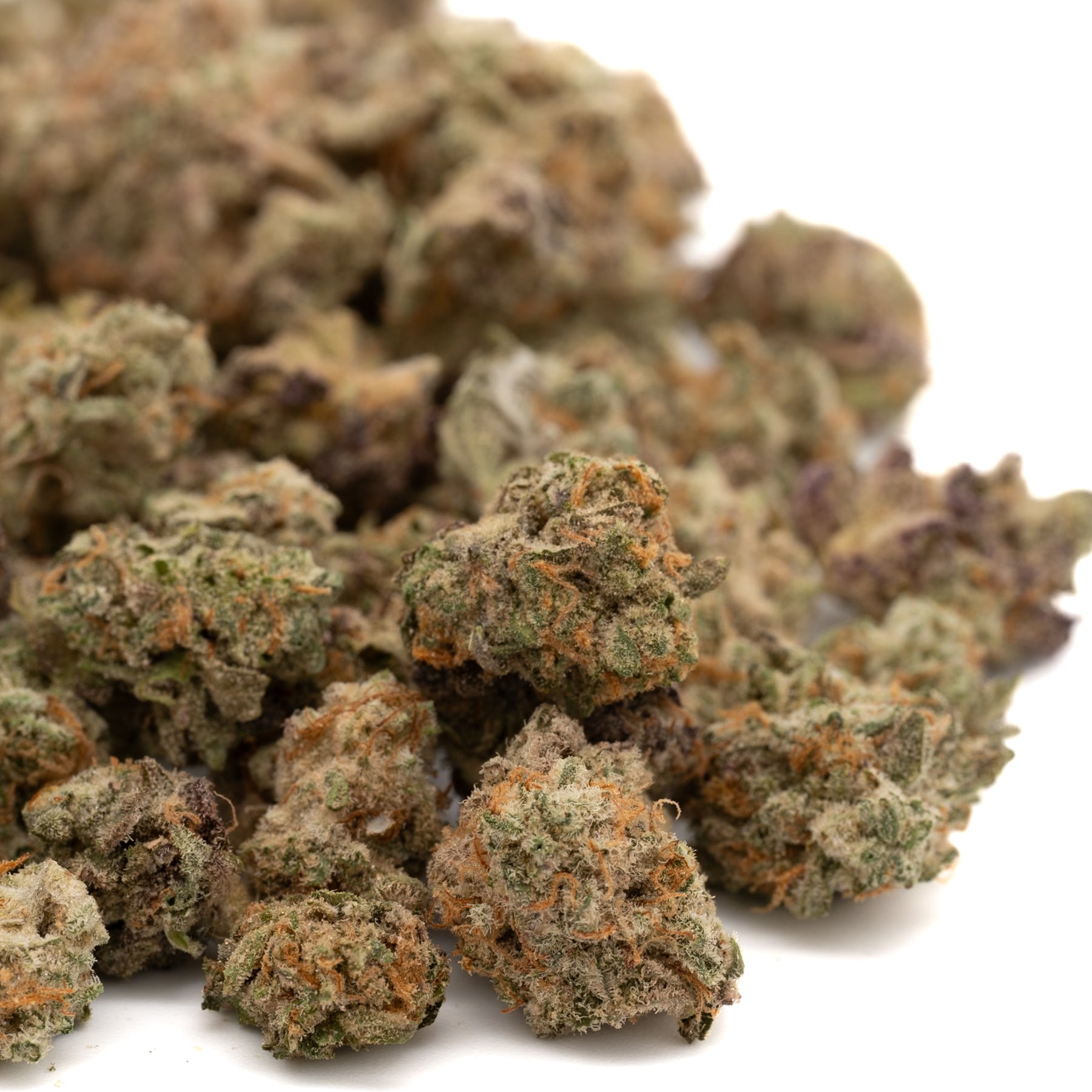 Premium Pressure THCa indoor hemp flower buds in a pile of THCa Smalls