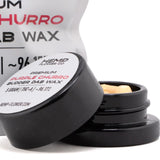 Black cylindrical container of purple churro thca budder wax by hemp flower co with cinnamon horchata flavor 5 gram