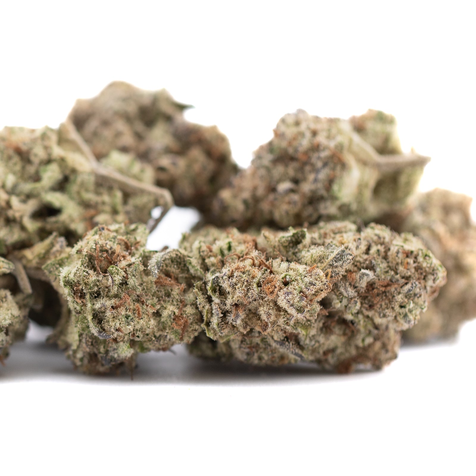 Purple Pop Rocks THCa hemp flower buds with green, brown hues and trichomes