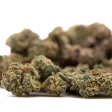 Pile of dried cannabis buds from Purple Wedding Indoor THCa Flower Smalls featuring wedding cake hemp flower