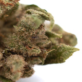 Rna cbd hemp flower full-term smalls featuring dense green cbg hemp flower covered in trichomes and orange pistils
