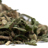 A pile of greenish-brown full-term thca flower leaves from royal highness with stems highlighting indoor cultivation terpene profile