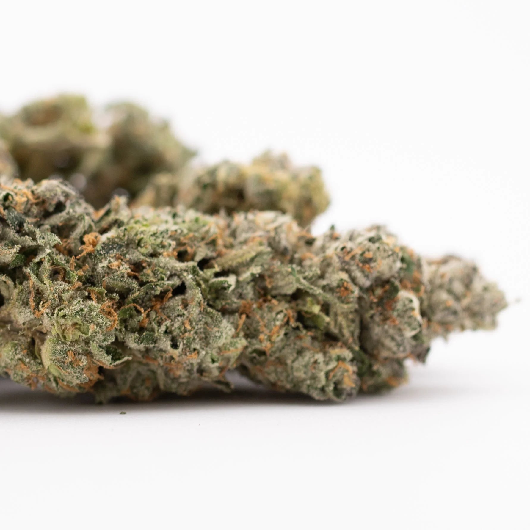 Rozay Cake THCa hemp flower bud with green trichomes and resin glands