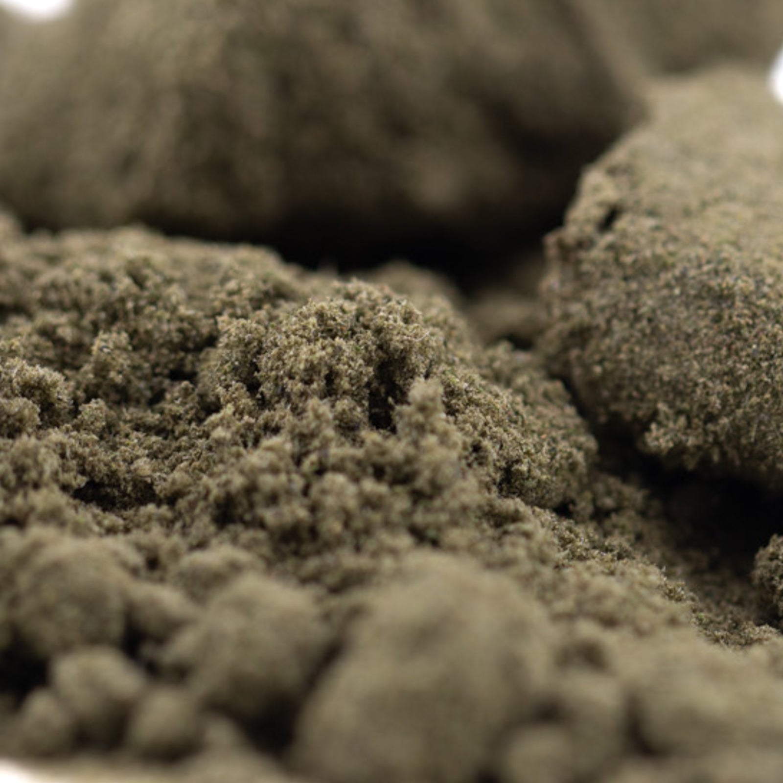 Runtz THCa Kief with sweet fruity characteristics, light brown hemp flower powder