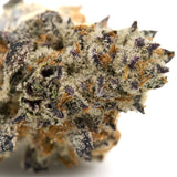 Close-up of Short Mintz Indoor THCa Flower with purple pistils and trichomes
