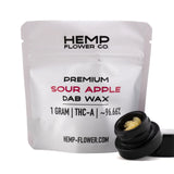 A white resealable pouch of hemp flower co sour apple 9666 percent thca dab wax highlighting sativa excellence