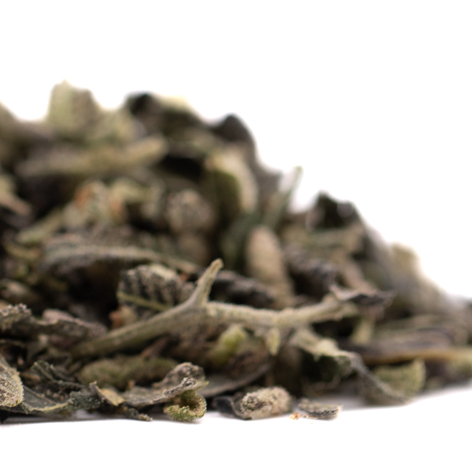 Loose leaf green tea with varying green and brown shades for Sour Candy Indoor Trim Wholesale 1LB