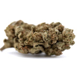 Sour Diesel THCa Flower: Dense Trichome Bud in Earthy Tones