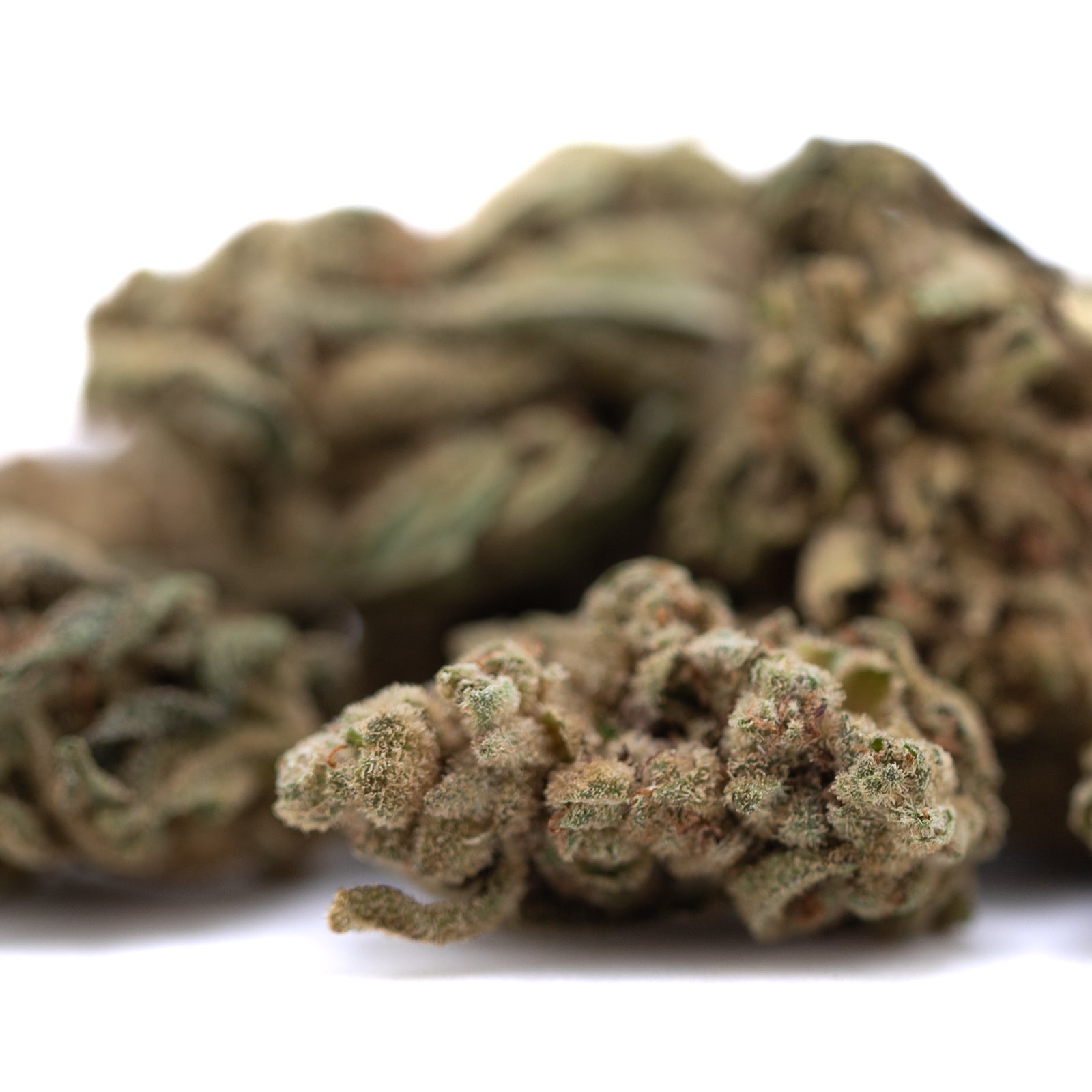 Sour Diesel THCa smalls flower buds with green and brown hues