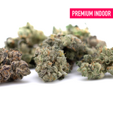 Pile of premium Sour Garlic Cookies indoor THCa flower hemp flower buds