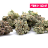 Pile of premium Sour Garlic Cookies indoor THCa flower hemp flower buds