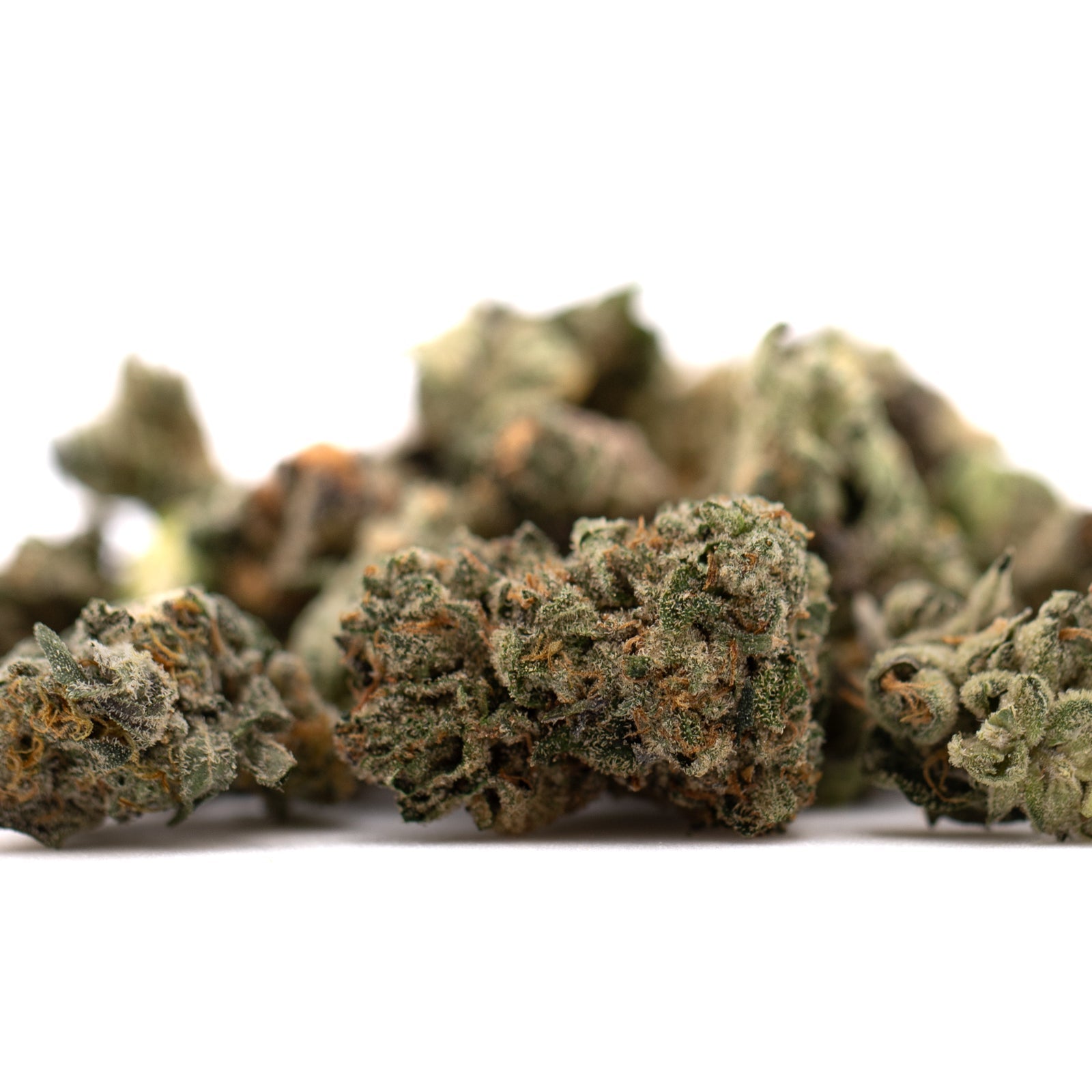 Pile of dried Sour Runtz THCa small indoor Runtz cannabis buds for sale