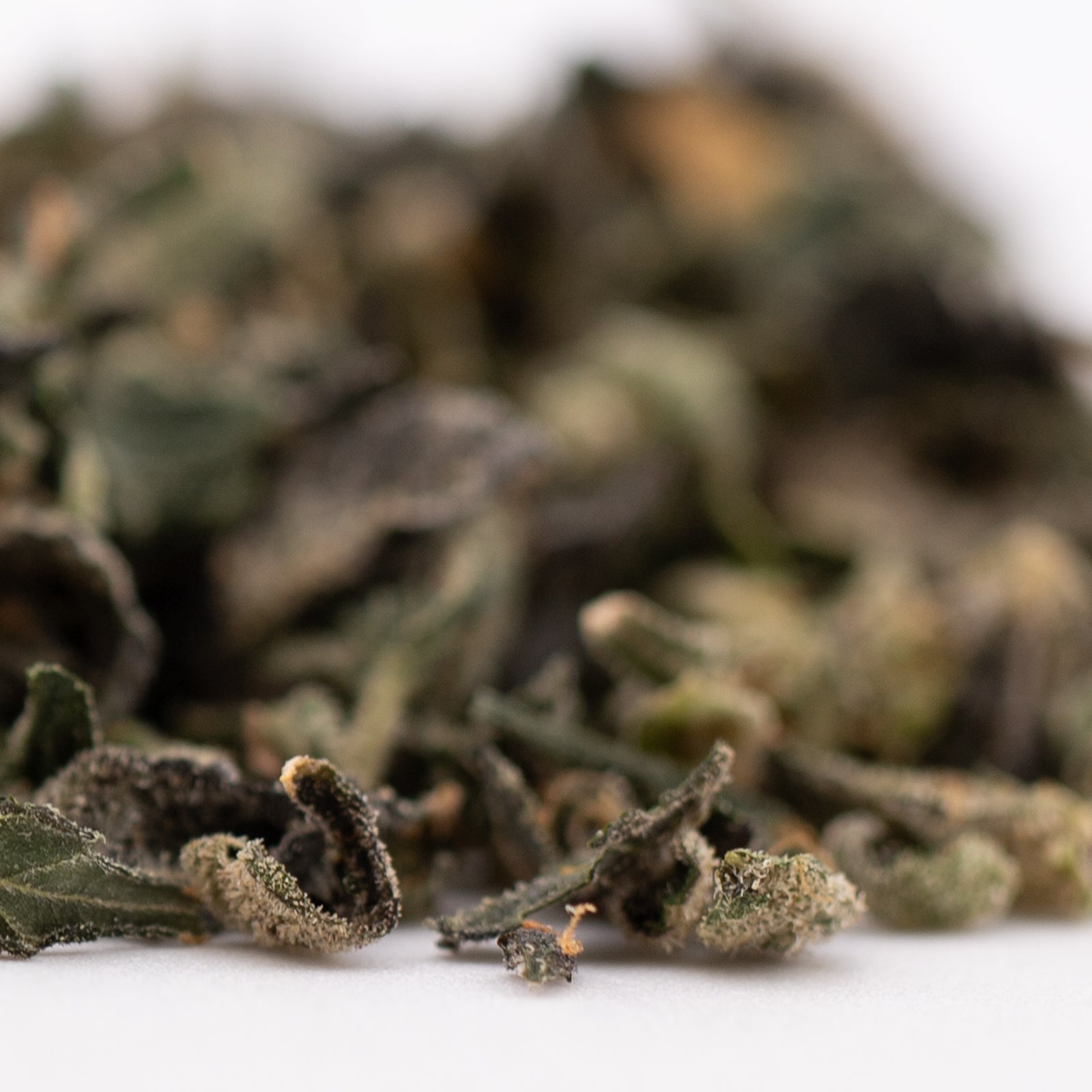 Loose leaf green tea with sour runtz indoor trim and rich terpene profile