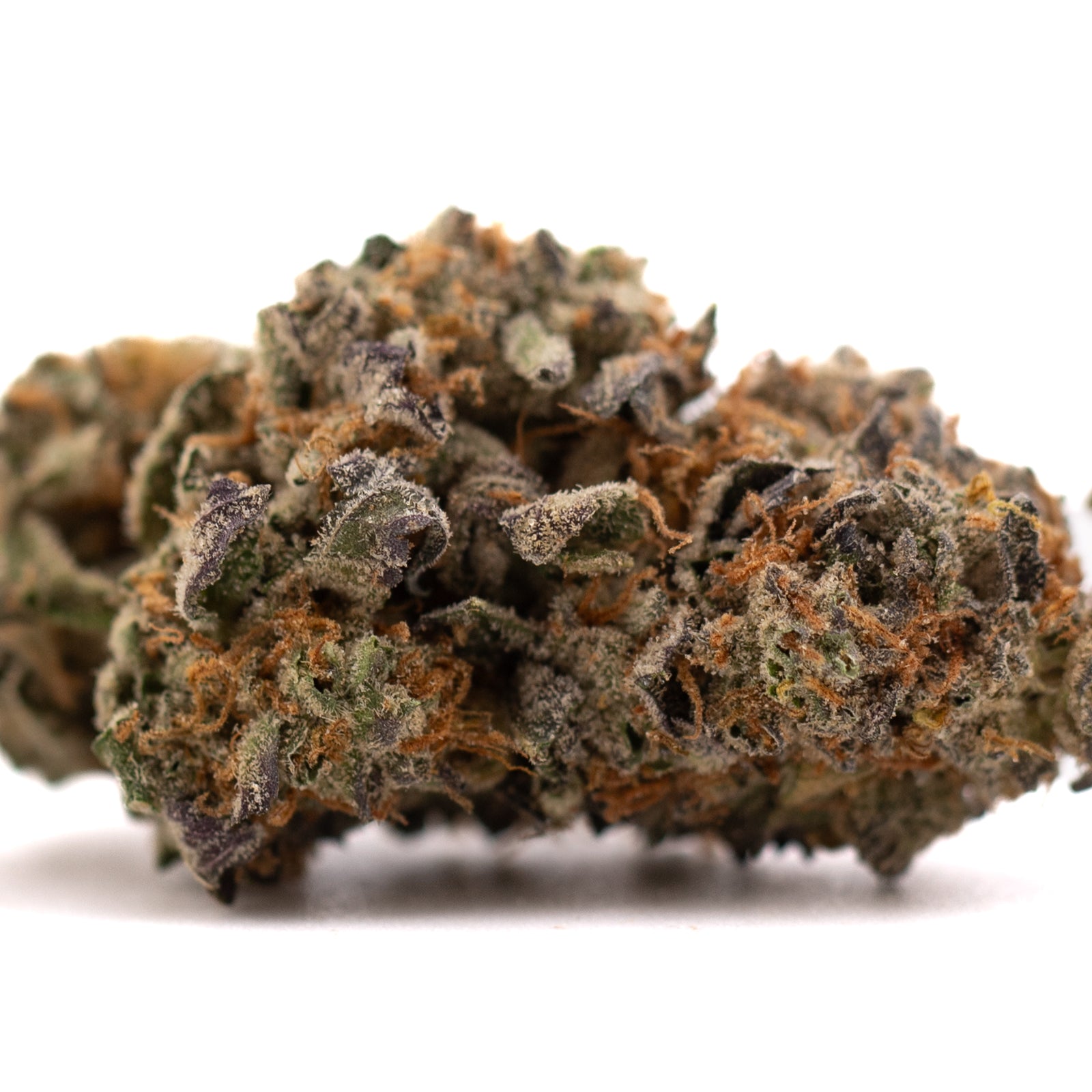 Southern Peaches THCa Flower with vibrant green purple hues and trichome-rich buds