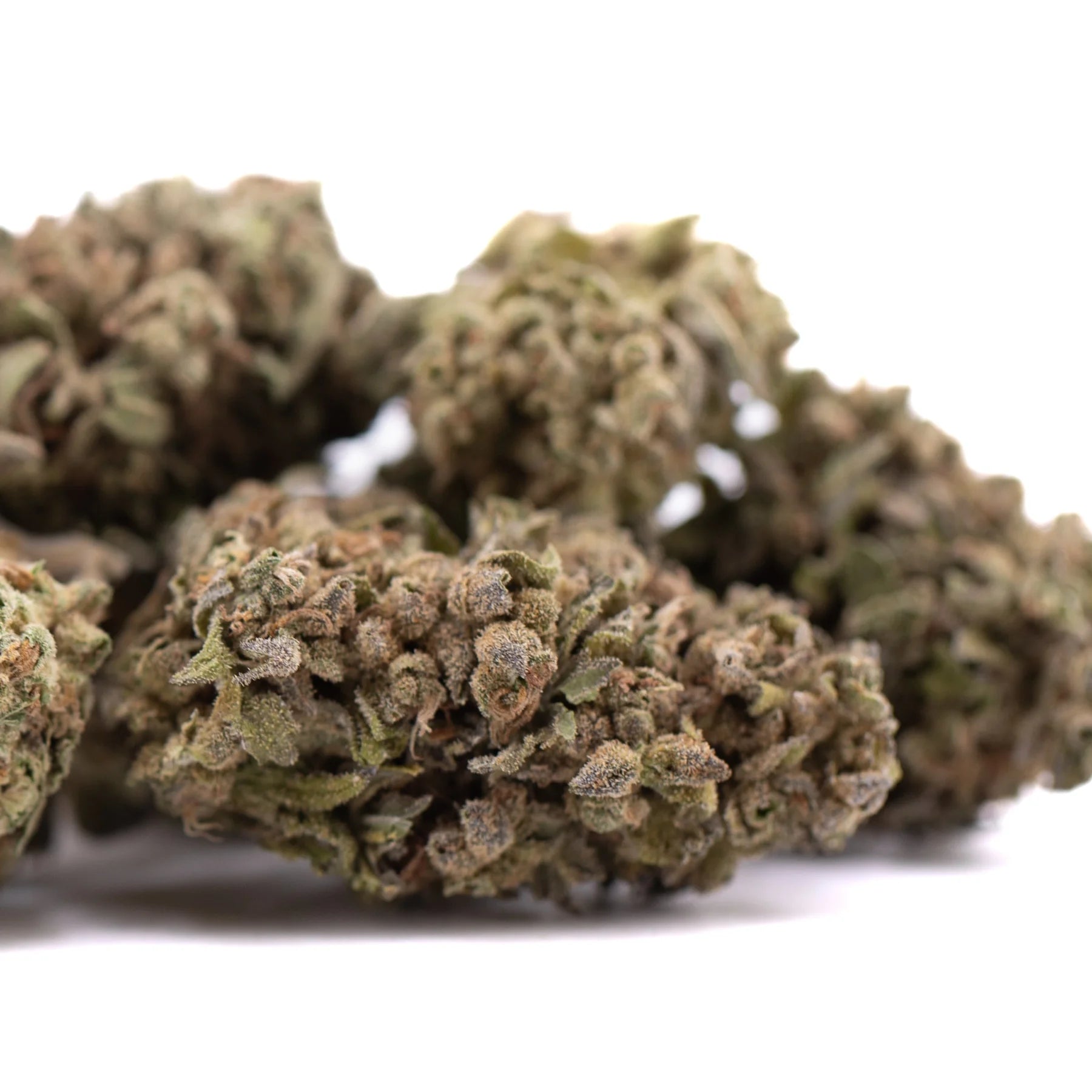 Dried strawberry cheesecake thca flower with dense trichome-covered buds in greenish-brown hues for bulk thca wholesale