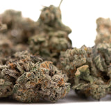 Pile of dried Cannabis buds with purple coloration from Street Tarts Indoor THCa Flower Wholesale