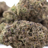 Mossy green and purple-tinged sugar thca hemp flower buds with dense frost-covered trichomes from greenhouse thca terpene profile