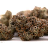 Dried Super Runtz cannabis buds with orange hairs and frosty trichomes from Orchard Swirl Synergy
