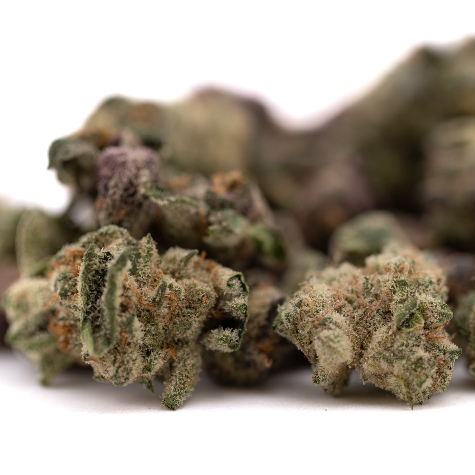 Super Runtz Indoor THCa Flower Smalls with dried cannabis buds and orange hairs