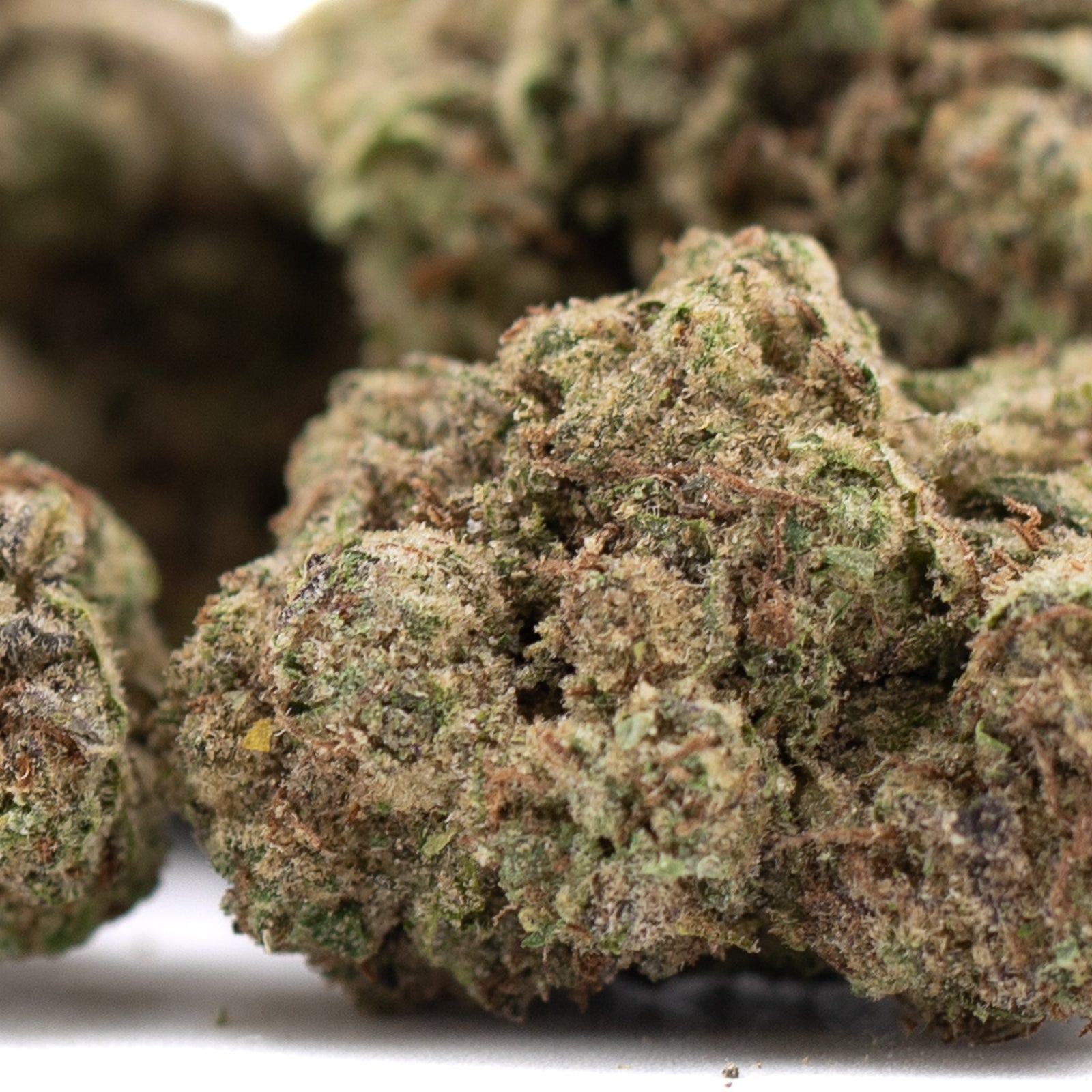 Super Runtz THCa hemp flower: green bud with white trichomes