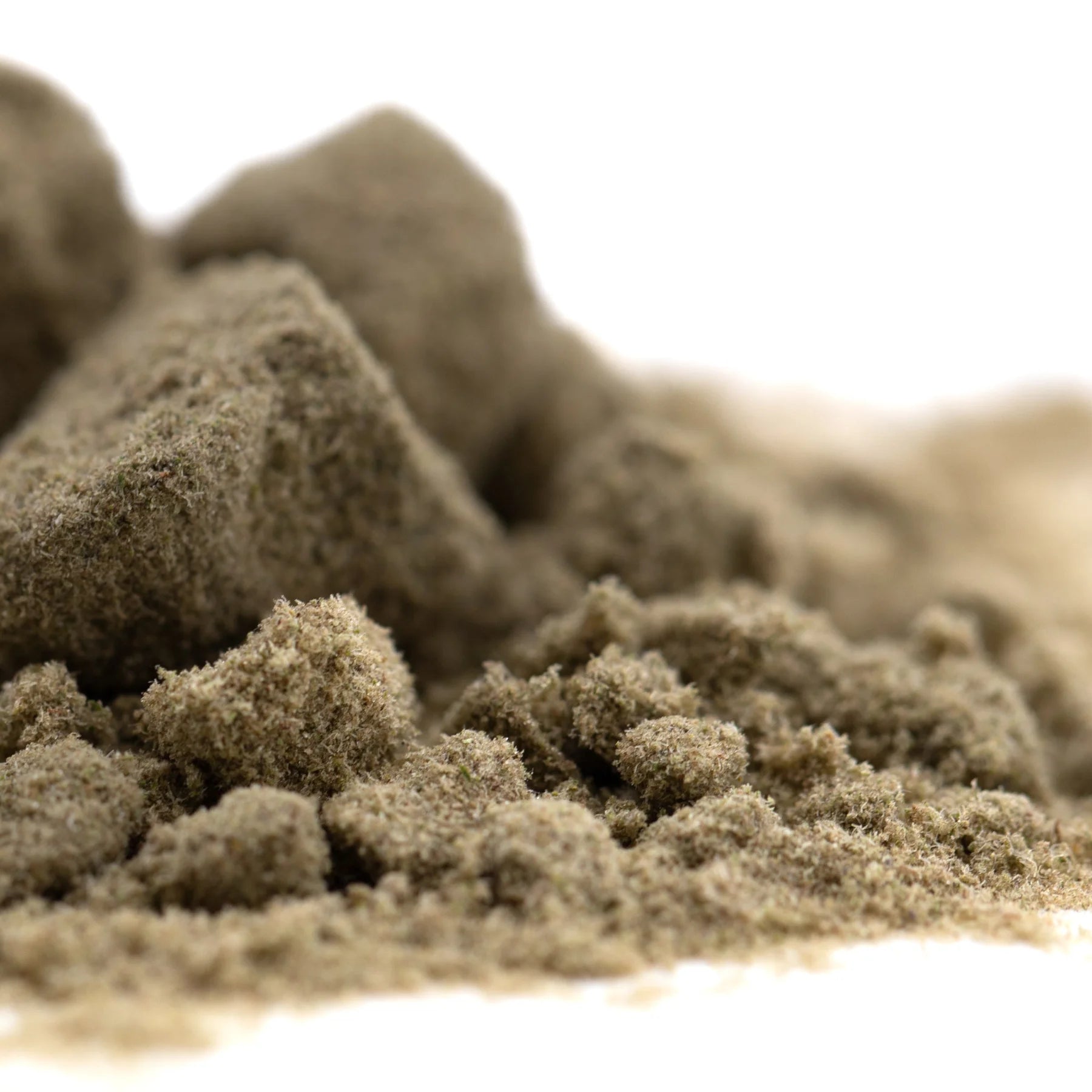 A mound of fine beige sand representing top gun thca kief full-term concentrated trichome from atlas star