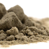 A mound of fine beige sand representing top gun thca kief full-term concentrated trichome from atlas star