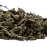 Dried muted green and brown sage leaves with a fuzzy texture in tricross full-term thca trim wholesale product