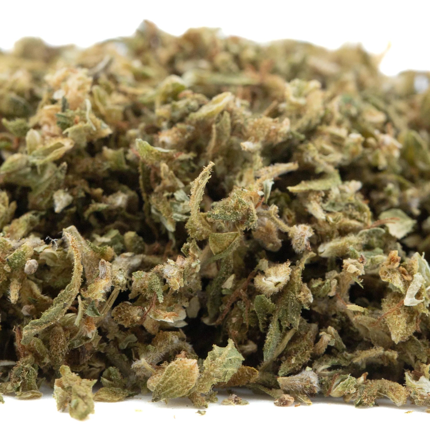 A pile of tune cbd hemp flower trim with green brown and white trichomes featuring pre converted cbd pivot f1 hybrid and auto tsunami