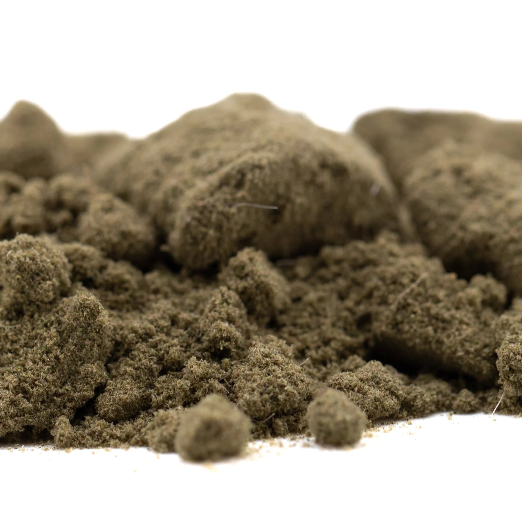 Brown textured flocking material resembling soil used in turtle taffy thca kief hemp flower product display