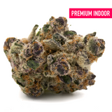 Wedding Cheesecake Indoor THCa Flower with dense trichome-covered purple and green cannabis bud